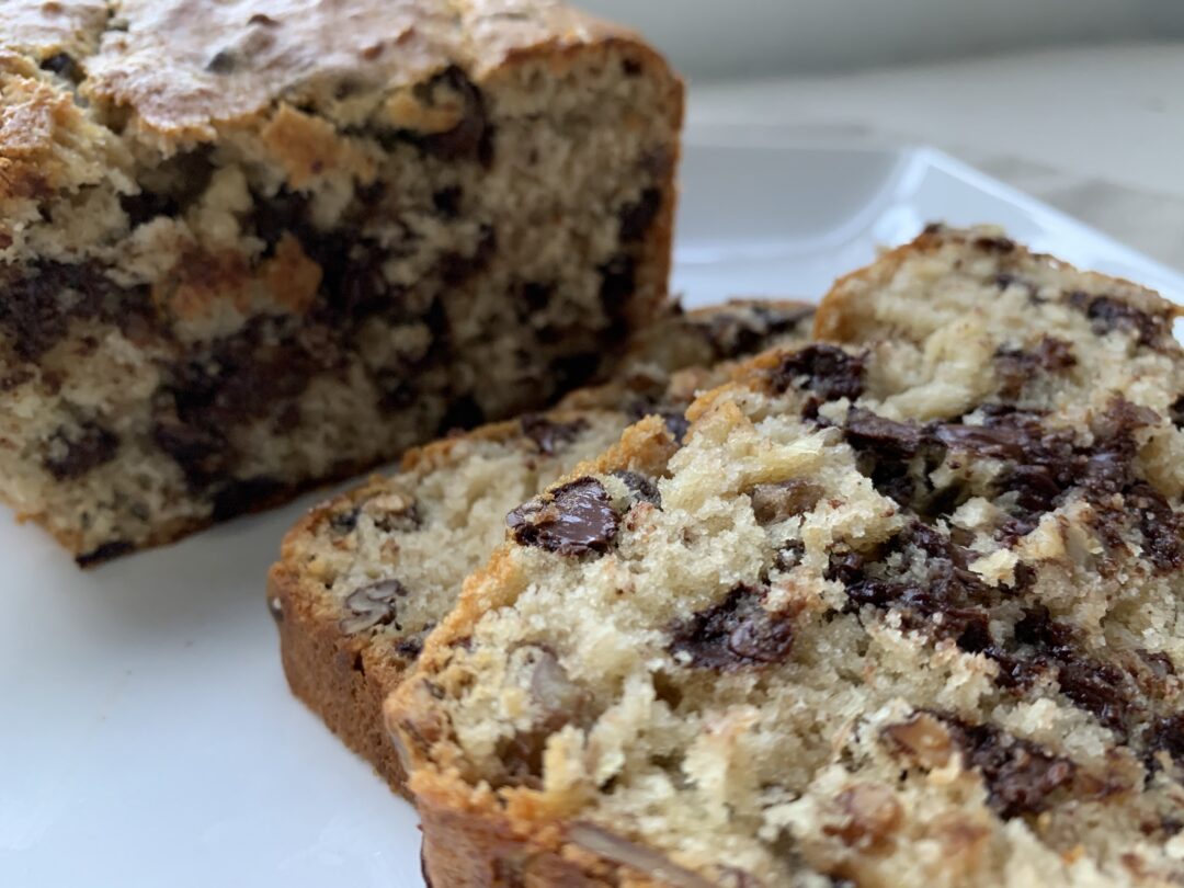 Chocolate Chip Banana Nut Bread on white plate