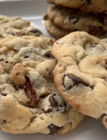 chocolate chip pecan cookies on white plate