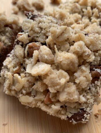 Oatmeal Chocolate Caramel Bars on Bamboo Cutting Board