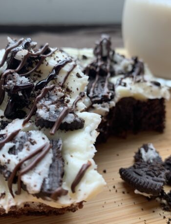 Cookies and Cream Fudgy Brownies with glass of milk