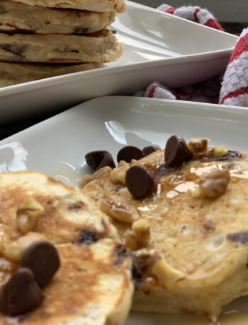 Chocolate Chip Buttermilk Pancakes with walnuts and syrup